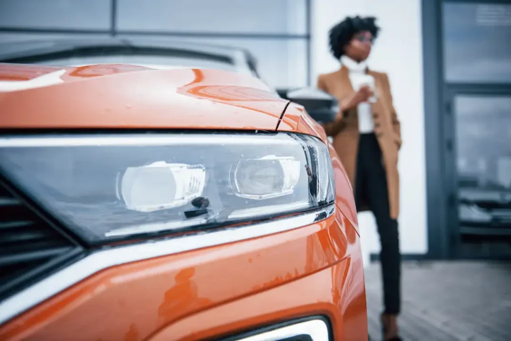 african american woman with new car in mesa arizona